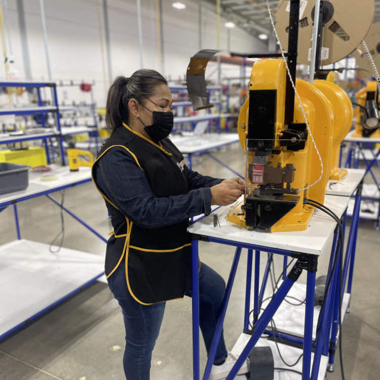 woman working on a machine